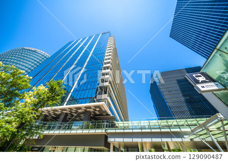Yokohama cityscape in July. Overlooking the business district in front of Shin-Takashima Station. 129090487