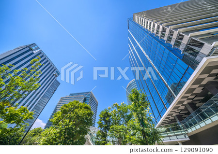 Yokohama cityscape in July. Overlooking the business district in front of Shin-Takashima Station. Yokohama cityscape in July. Overlooking the business district in front of Shin-Takashima Station. 129091090
