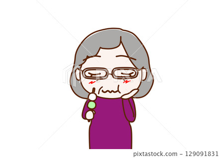 (Front view of upper body) An elderly woman enjoying a delicious three-colored dumpling. 129091831
