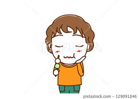 (Front view of upper body) A Caucasian boy enjoying a delicious three-colored dumpling 129091846
