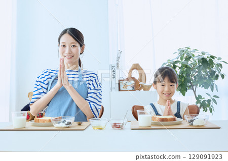 A healthy breakfast of bread and yogurt for parents and children A healthy breakfast of bread and yogurt for parents and children 129091923