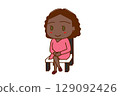 (Full-body angle) African American woman sitting in a chair with her legs crossed and smiling 129092426