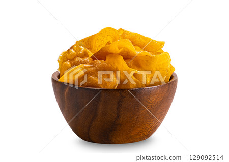 Sweet crispy potato chips in wooden bowl isolated on white background with clipping path. Sweet crispy potato chips in wooden bowl isolated on white background with clipping path. 129092514
