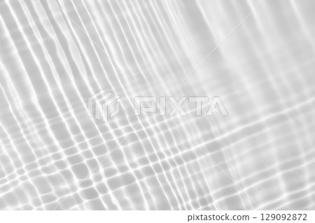 Abstract white transparent water shadow surface texture natural ripple background 129092872