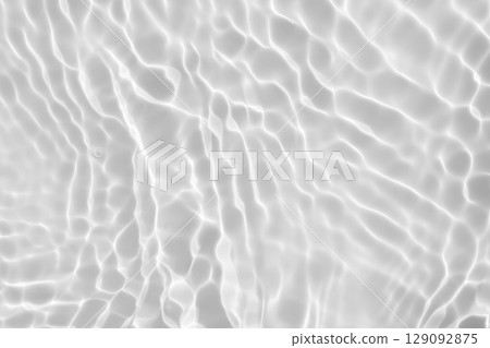 Abstract white transparent water shadow surface texture natural ripple background 129092875