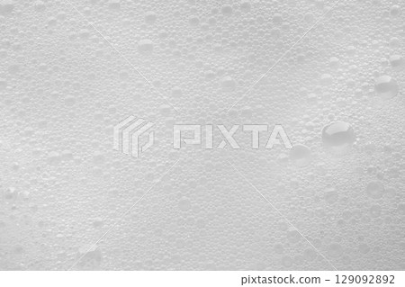 Abstract white soap foam bubbles texture background 129092892