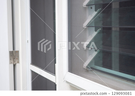 mosquito net wire screen on house window protection against insect 129093081