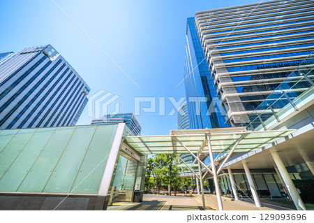 Yokohama cityscape in July, Japan. View of Shin-Takashima Station and the business district. Yokohama cityscape in July, Japan. View of Shin-Takashima Station and the business district. 129093696