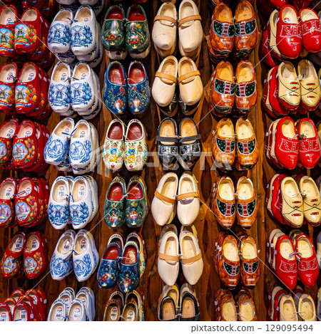 Set of different colorful vintage Dutch wooden clogs Set of different colorful vintage Dutch wooden clogs 129095494