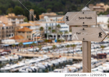 Hiking trail signs above the harbour bay of Port Soller, Majorca, Mallorca, Balearic Islands, Spain, Europe 129095675