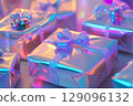 Gift boxes with colorful lights in the background close-up 129096132