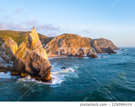 Ursa Beach, Cliffs and Atlantic Ocean Waves at Sunset. Portugal. Aerial View Ursa Beach, Cliffs and Atlantic Ocean Waves at Sunset. Portugal. Aerial View 129096424