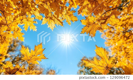 Bright blue abstract shape against orange blurred background 129096472