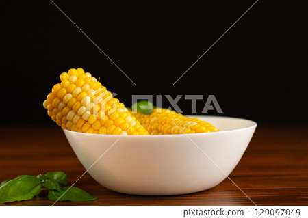 yellow corn in a plate close-up yellow corn in a plate close-up 129097049