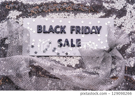 Abstract background of silver sequins with the inscription BLACK FRIDAY SALE. 129098266