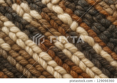 Close-Up of Knitted Fabric Featuring Diagonal Stripes Texture 129098360