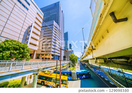Yokohama cityscape in Japan: In front of Yokohama Station. View of the East Exit rotary and the ETC entrance for the Metropolitan Expressway. 129098380