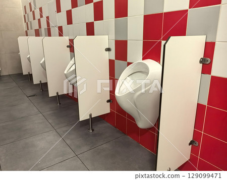 Modern restroom design showcases creativity with vibrant red tiles Modern restroom design showcases creativity with vibrant red tiles 129099471