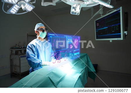 Surgeon using ar glasses to visualize patient anatomy during operation, high-tech medical procedure Surgeon using ar glasses to visualize patient anatomy during operation, high-tech medical procedure 129100077