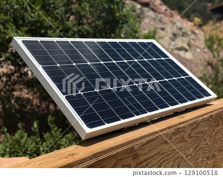 Modern Solar Panel Harnessing Sunlight in Nature Modern Solar Panel Harnessing Sunlight in Nature 129100518