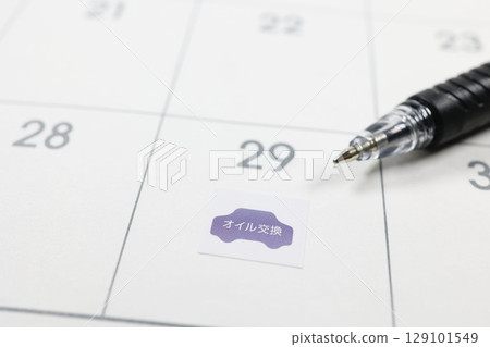 Calendar and stickers showing due dates for oil changes Calendar and stickers showing due dates for oil changes 129101549