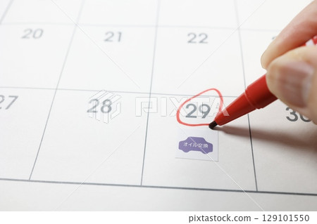 Calendar and stickers showing due dates for oil changes Calendar and stickers showing due dates for oil changes 129101550