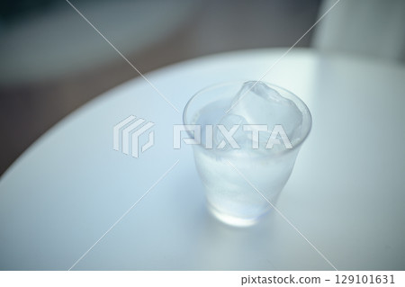 Glass with water Glass with water 129101631