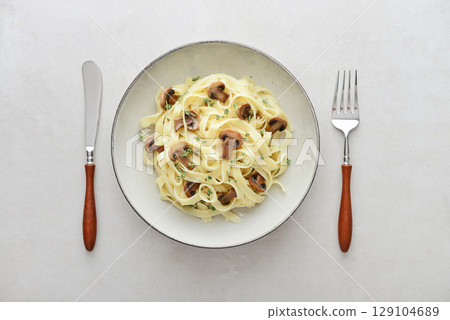 Mushroom pasta with cream parmesan cheese Mushroom pasta with cream parmesan cheese 129104689