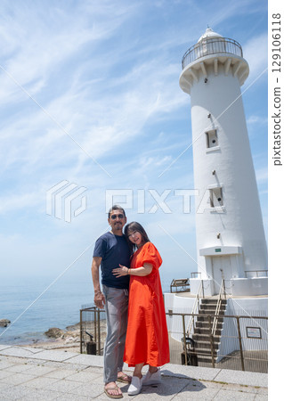 Couple traveling to Nomazaki Lighthouse in summer 129106118