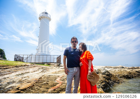 Couple traveling to Nomazaki Lighthouse in summer 129106126