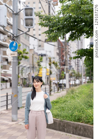 Young woman going out Young woman going out 129107276