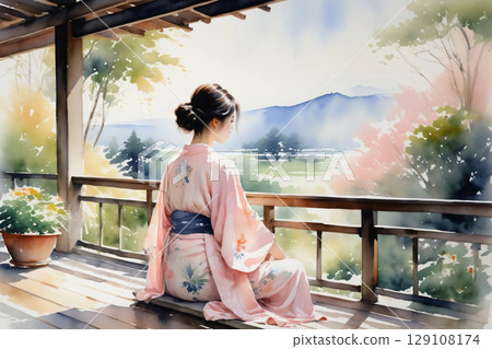 A woman in a yukata relaxing on the veranda, a calm afternoon with a Japanese atmosphere 129108174