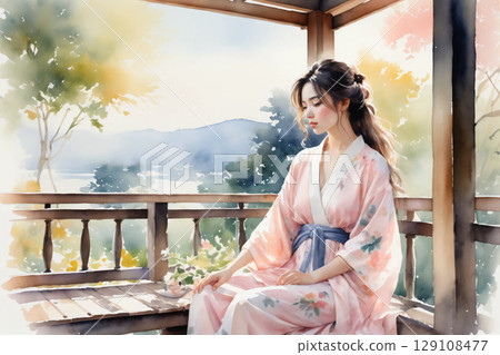A woman in a yukata relaxing on the veranda, a calm afternoon with a Japanese atmosphere 129108477
