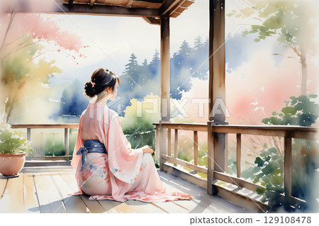A woman in a yukata relaxing on the veranda, a calm afternoon with a Japanese atmosphere 129108478