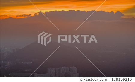 City skyline glows softly in twilight hour July 29 2025 129109210