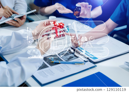 Medical technology network team meeting concept. Doctor hand working with smart phone modern digital tablet and laptop 129110119