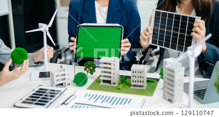 Business team people planning hand using laptop for working technology and business Net zero and carbon neutral concept.NET ZERO icons Business team people planning hand using laptop for working technology and business Net zero and carbon neutral concept.NET ZERO icons 129110747