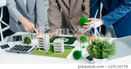 Business team people planning hand using laptop for working technology and business Net zero and carbon neutral concept.NET ZERO icons 129110776
