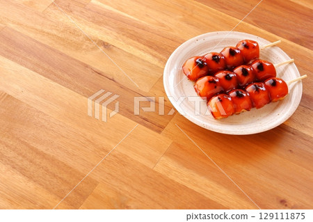 Kushi Dango - Delicious Mitarashi Dango with a fragrant soy sauce sauce Kushi Dango - Delicious Mitarashi Dango with a fragrant soy sauce sauce 129111875