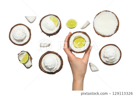 Hand holds coconut shell with ice cream, isolated on white, PNG Hand holds coconut shell with ice cream, isolated on white, PNG 129113326