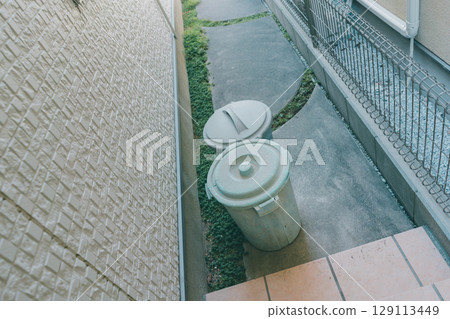 Plastic buckets in a garbage dump 129113449