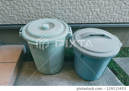Plastic buckets in a garbage dump Plastic buckets in a garbage dump 129113453