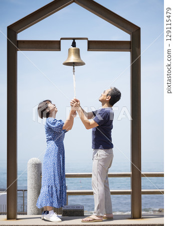 A friendly couple enjoying sightseeing 129115479