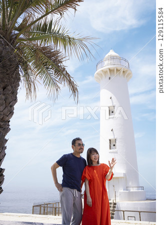 A friendly couple enjoying sightseeing 129115584