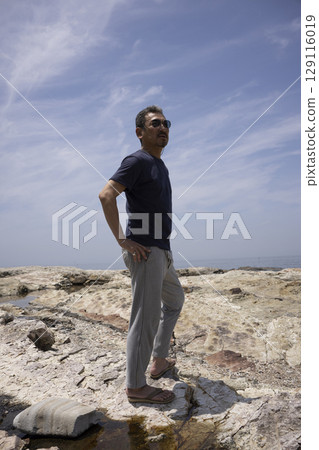A handsome middle-aged man enjoying domestic travel 129116019