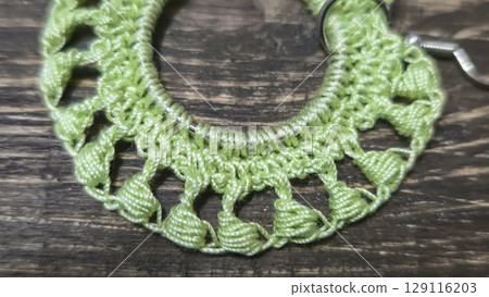 Round green earrings made of thin cotton threads, hand-knitted. Handmade. 129116203