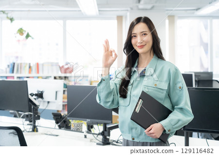 Young female engineer working in the office Young female engineer working in the office 129116482
