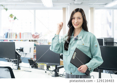 Young female engineer working in the office Young female engineer working in the office 129116483