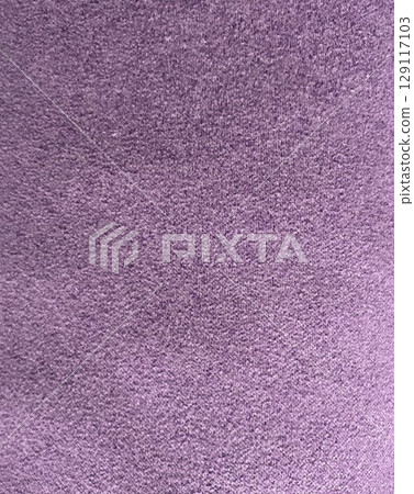 Aged purple background texture that resembles sandy paper with a rough texture Aged purple background texture that resembles sandy paper with a rough texture 129117103