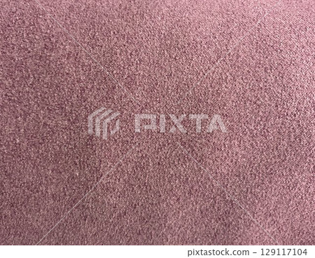 Aged red background texture that resembles sandy paper with a rough texture Aged red background texture that resembles sandy paper with a rough texture 129117104